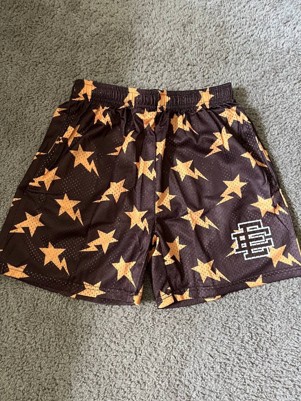 Eric Emanuel Black Athletic Shorts with Orange Star & Lightning Print